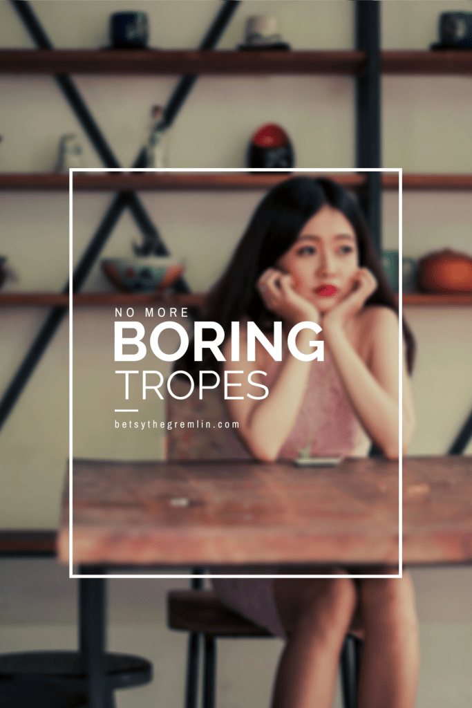 Pinterest pin. Depicts a woman with her head in her hands looking bored. Reads, "No more boring tropes."